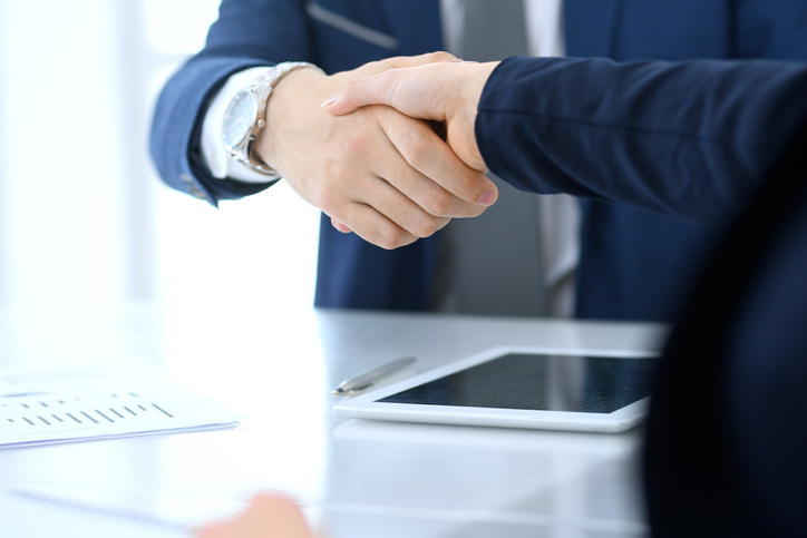 Group Of Business People Or Lawyers Shaking Hands Finishing Up A Meeting , Close Up. Success At Negotiation And Handshake Concepts